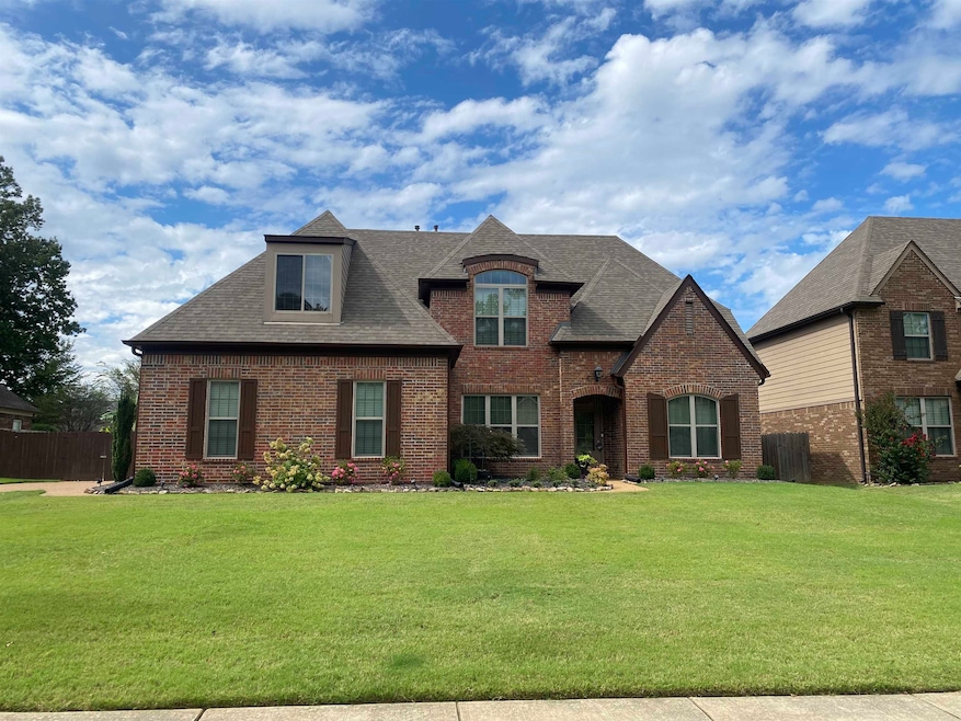 View of front of home with a front lawn