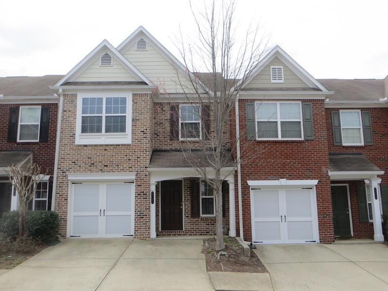 Multi unit property with an attached garage, brick