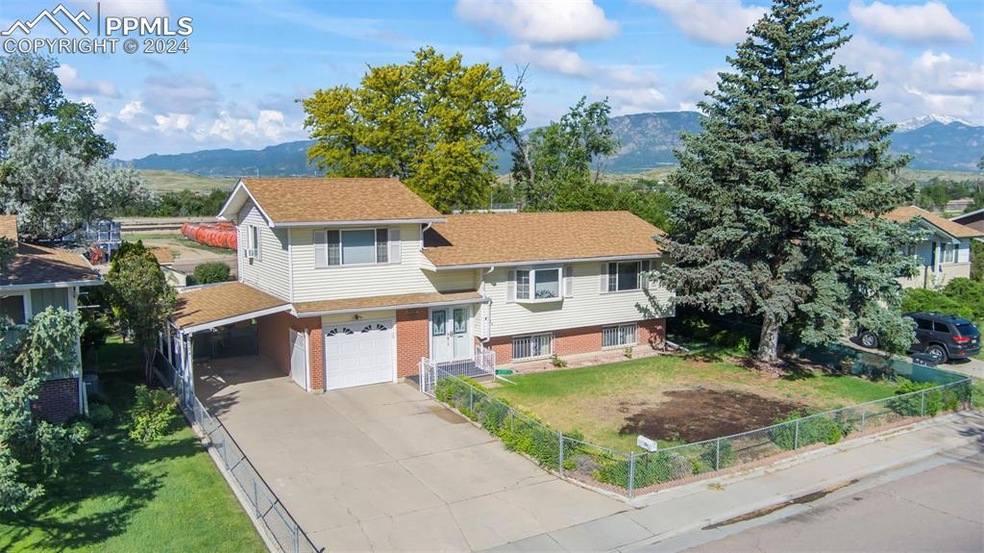 Charming home featuring landscaped front and back 
