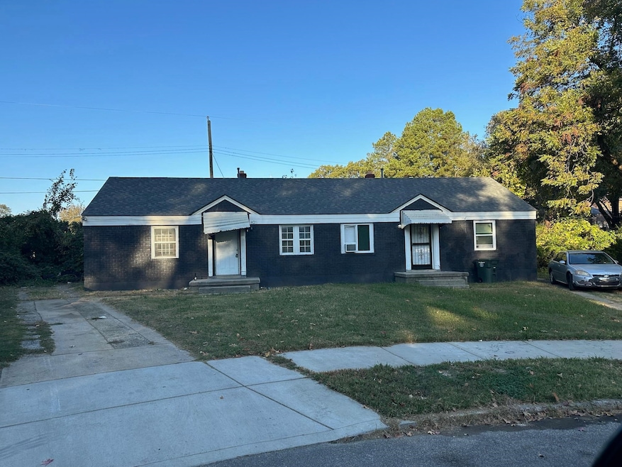 Single story home featuring a front yard