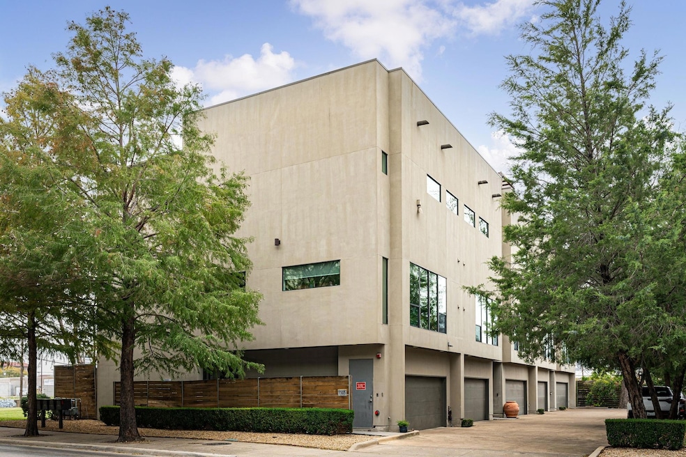 View of property featuring a garage