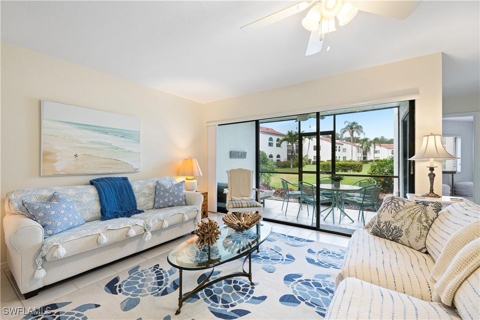 565 Beachwalk Cir unit 102, Naples, FL 34108 - photo 1