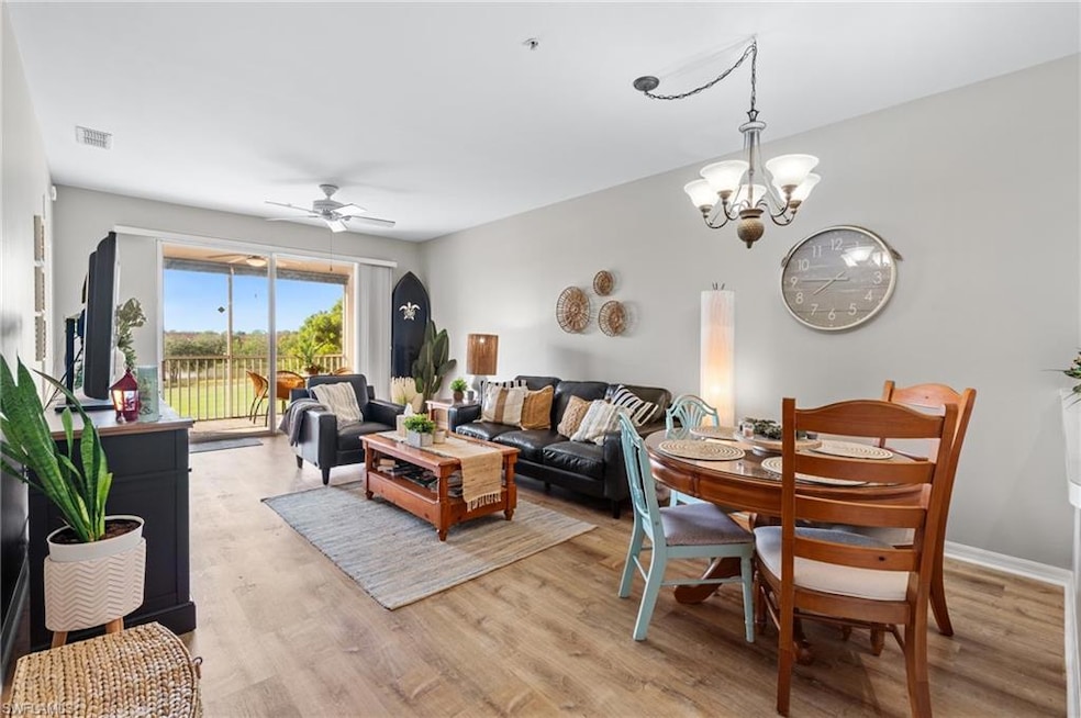 Dining room featuring ceiling fan with notable cha