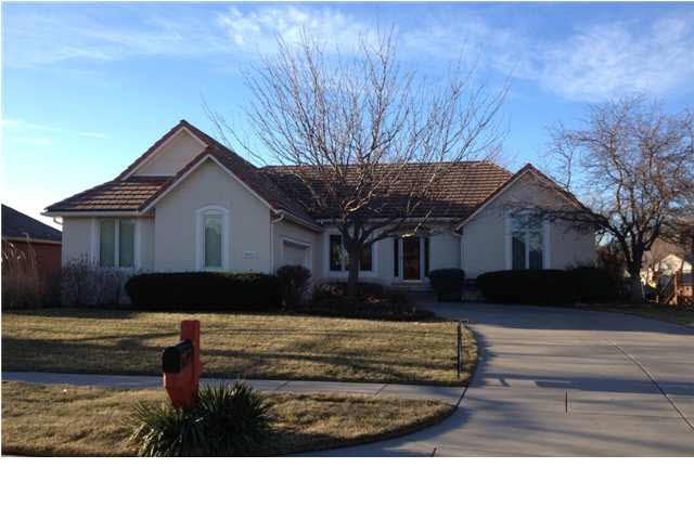 Located on a quiet street in a mature, lakefront n