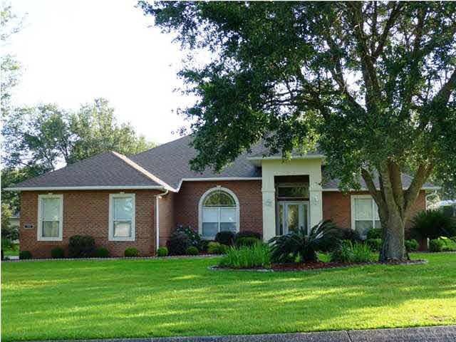 Welcome to 5500 Oakmont Dr on the 8th green of Stonebrook golf course, a gated, guarded community.