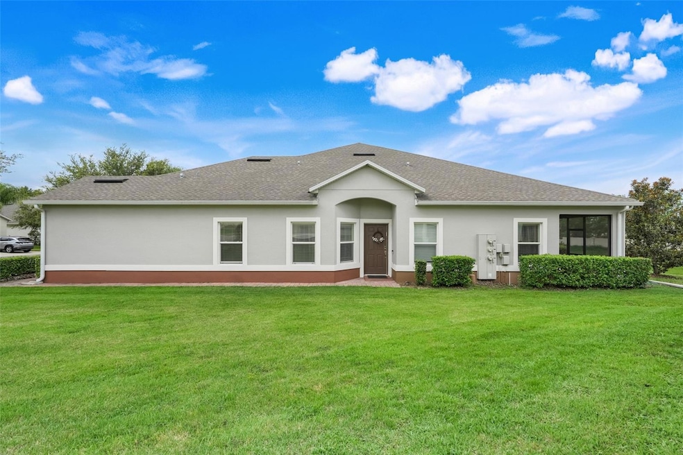 Welcome to your dream villa, where a beautifully paved walkway leads you from the driveway to the inviting front entrance.