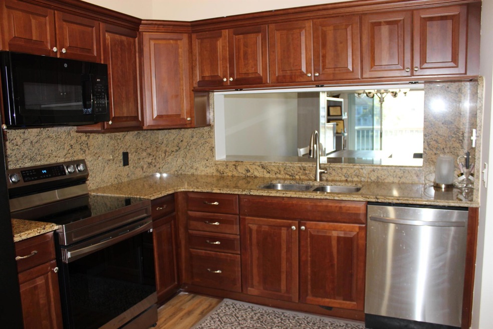 217 Cypress Point Dr unit 217, Palm Beach Gardens, FL 33418 - photo 1