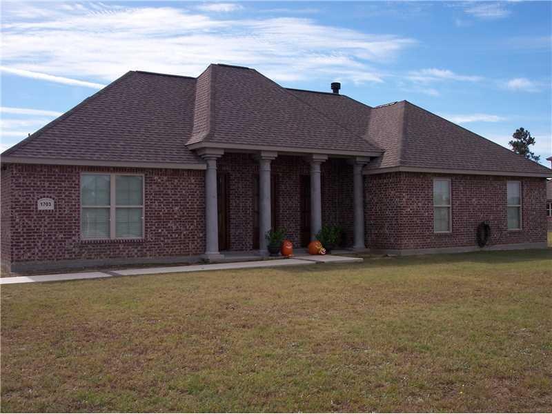 Exterior Front. BEAUTIFUL FRONT WITH PORCH AND STA