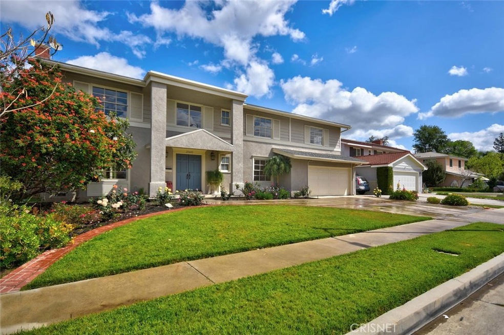 Dramatic curb appeal and overlooks nature preserve on flat 11,025 s.f. lot