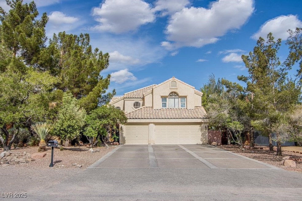 View of front of property featuring a 3 car garage