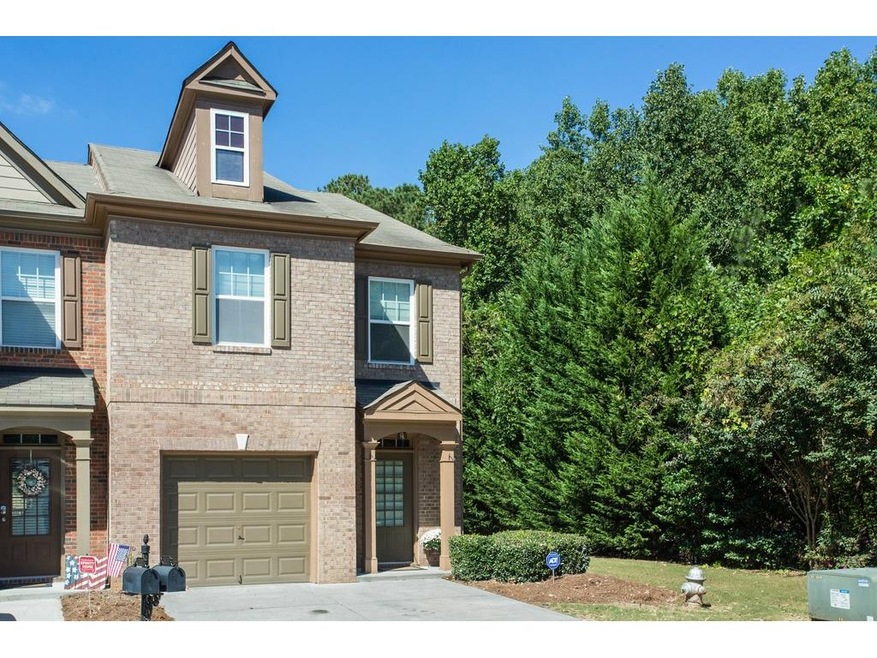 Rare end unit town home, backing up to the woods!