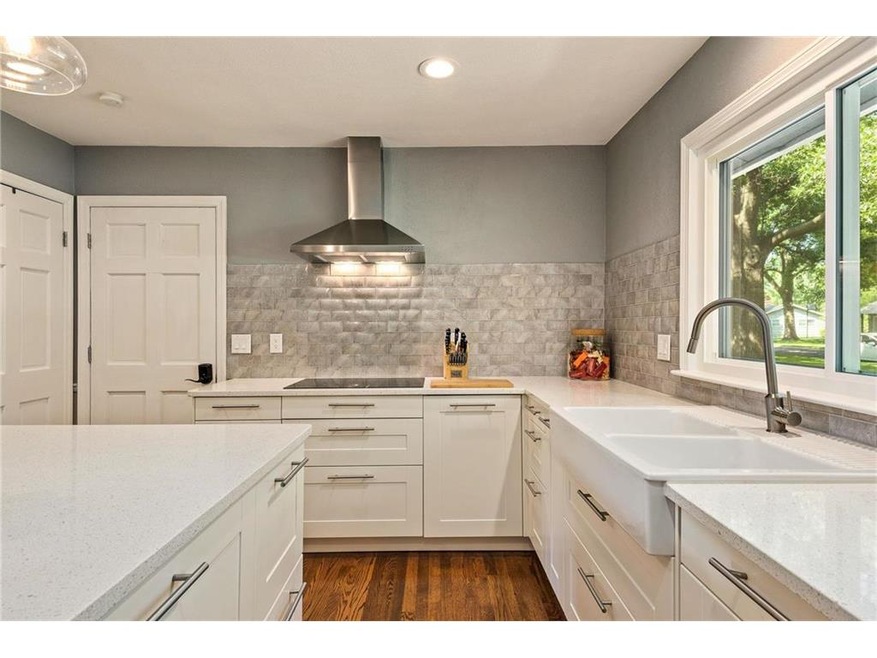 INCREDIBLE large white kitchen with every convenie