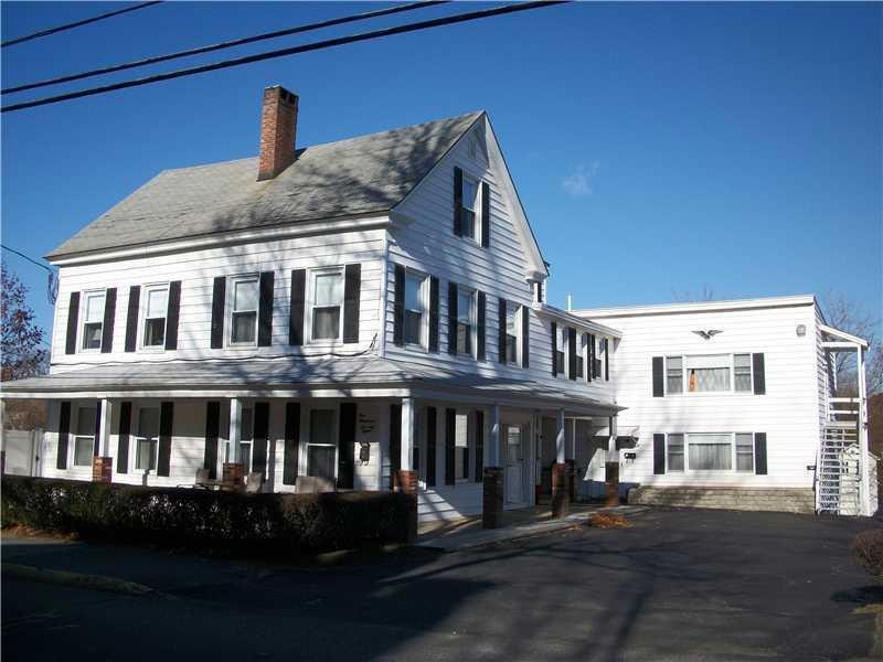 Exterior Front. Classically styled,...