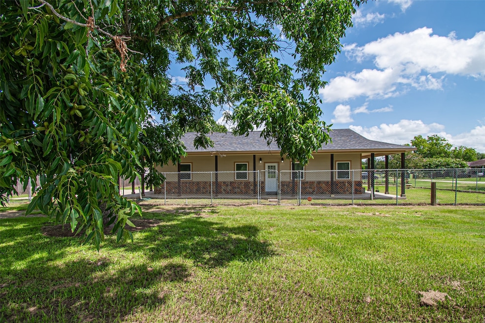 Charming one-story home with a covered porch & fen