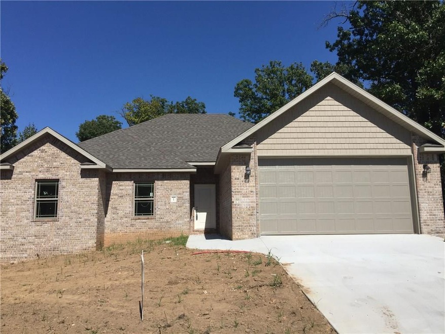 NEW 3 Bedroom, 2 Bath on a Large Corner Lot in Bella Vista!