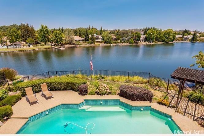 What a View from the Home's Deck! Beautiful Pool, Private Lake, and TOTAL SERENITY!