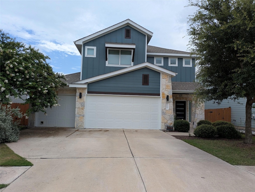 View of front of property with board and batten s