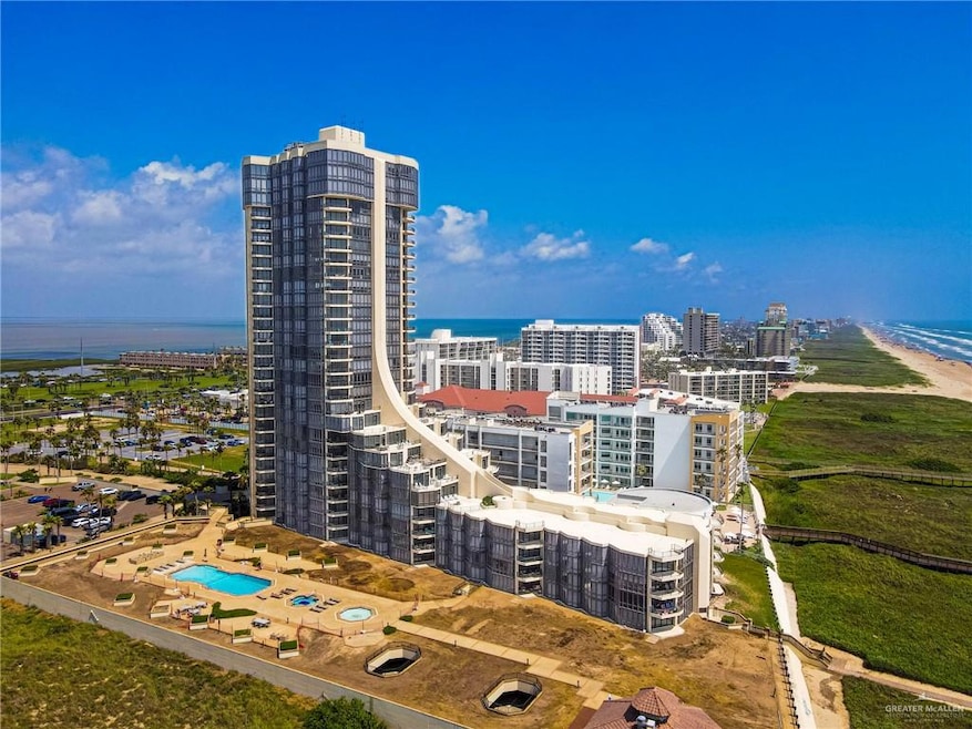 View of urban area with view of Gulf of Mexico and sparkling pool