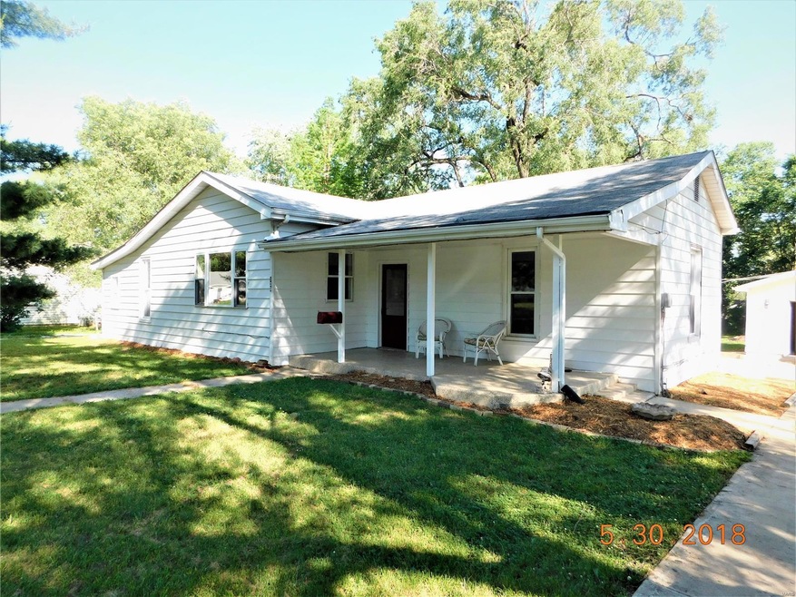 Shaded front yard with nice covered porch