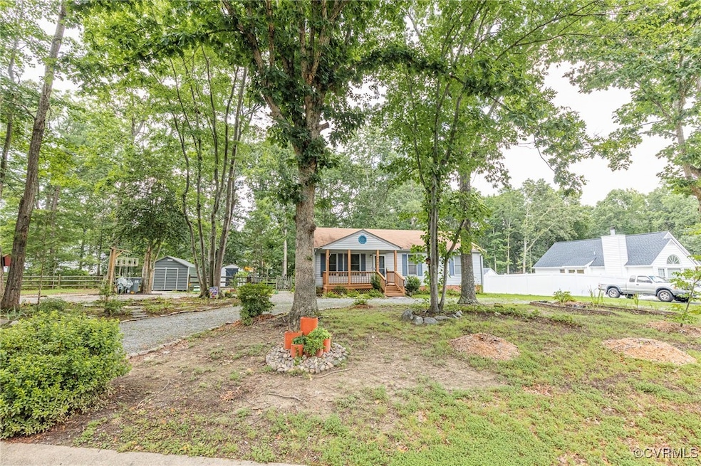 Bungalow-style home with covered porch, a storage