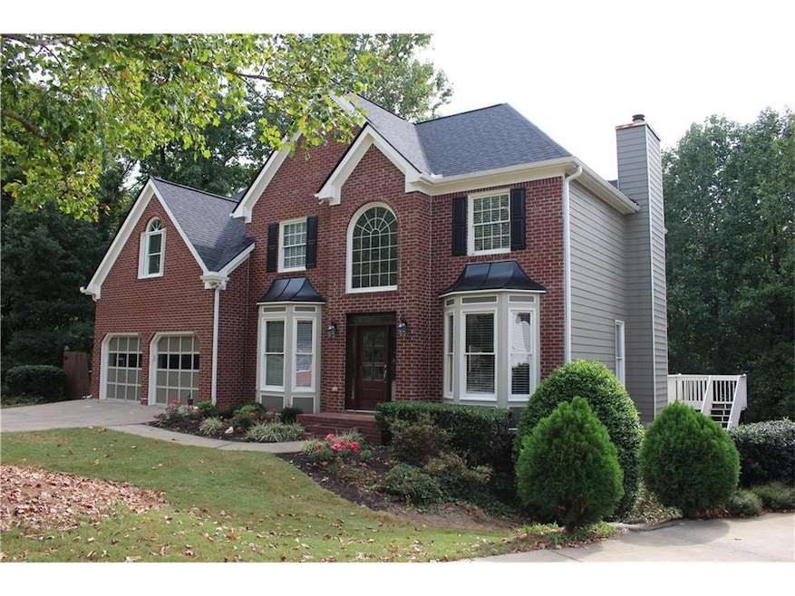 New Roof, brick front with Hardie Plank siding mak