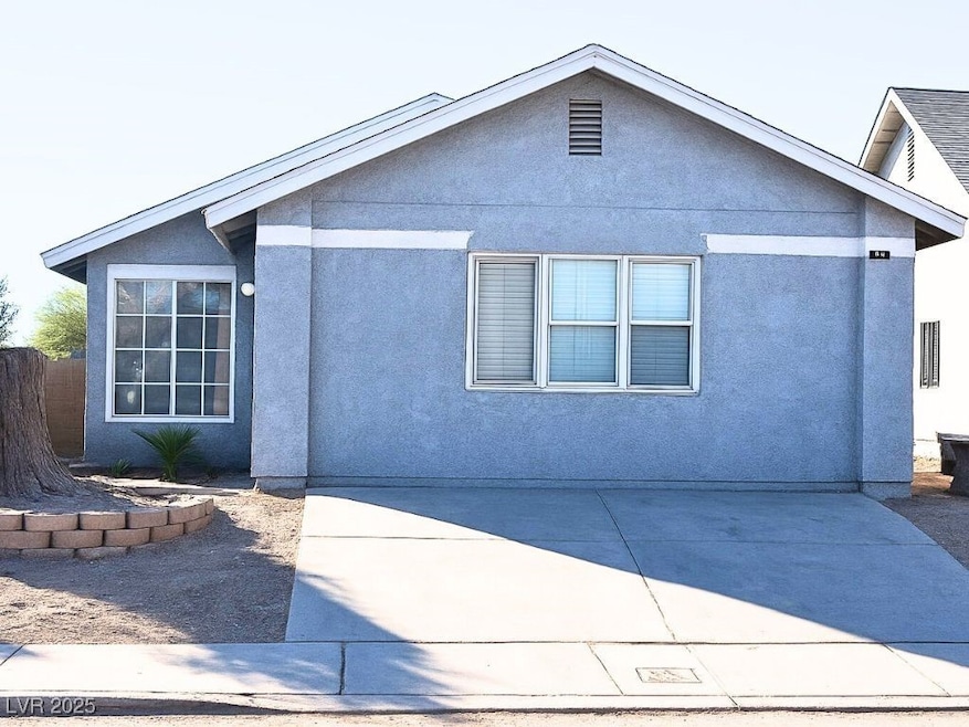 View of front of home with stucco siding