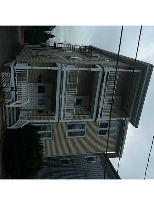Exterior Front. THREE DECKER WITH 3 BEDS IN EACH U