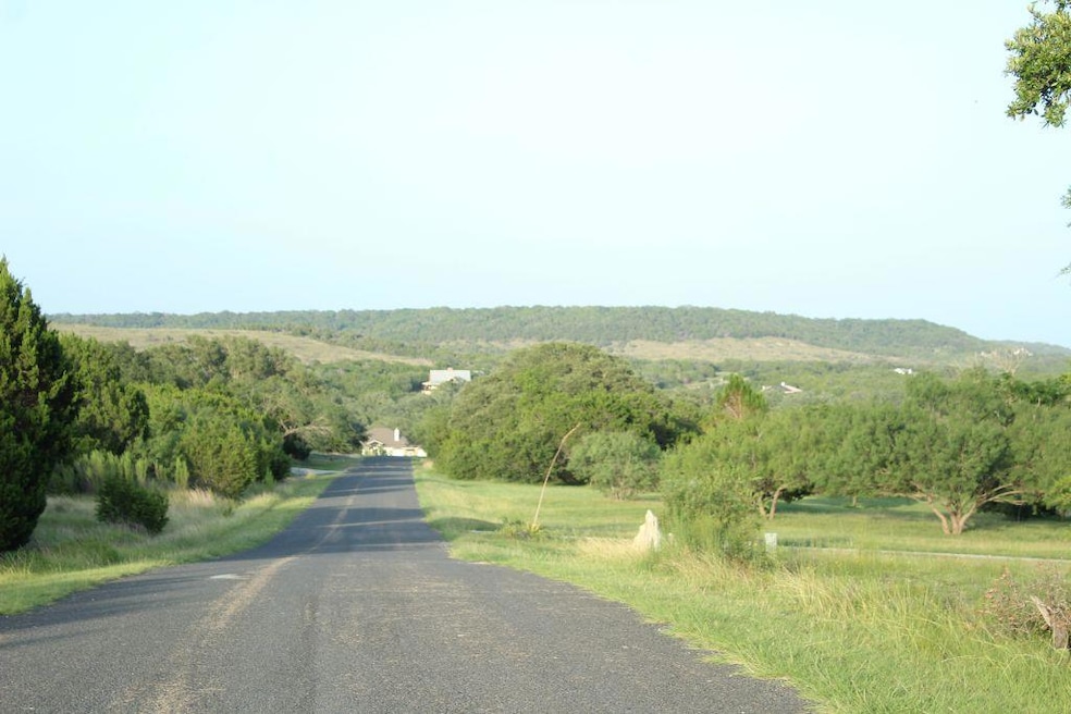 View of asphalt road with a rural view