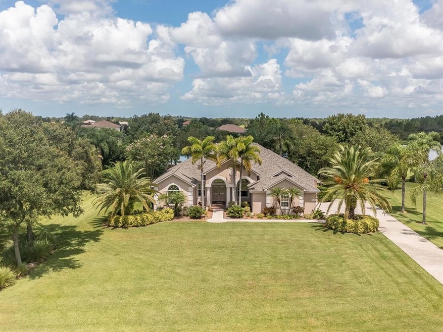 Welcome home. Nestled on a stunning lot in a cul d