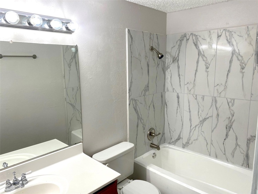 Updated bath with new tile surround