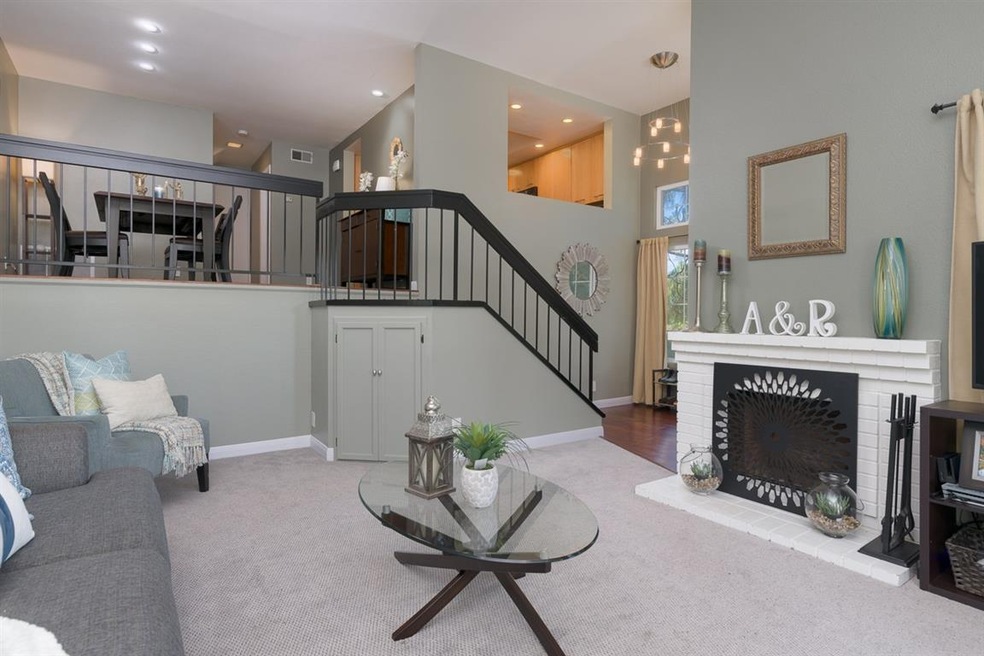 Living Room features fireplace and vaulted ceiling