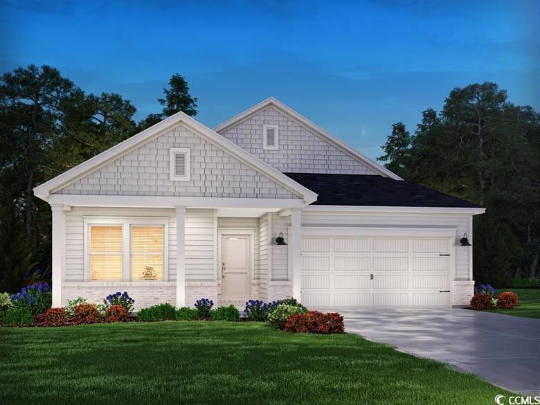 View of front facade with driveway, an attached ga
