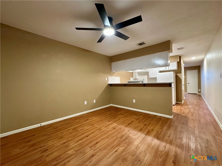 1409 N Bishop St unit 7, San Marcos, TX 78666 - photo 1