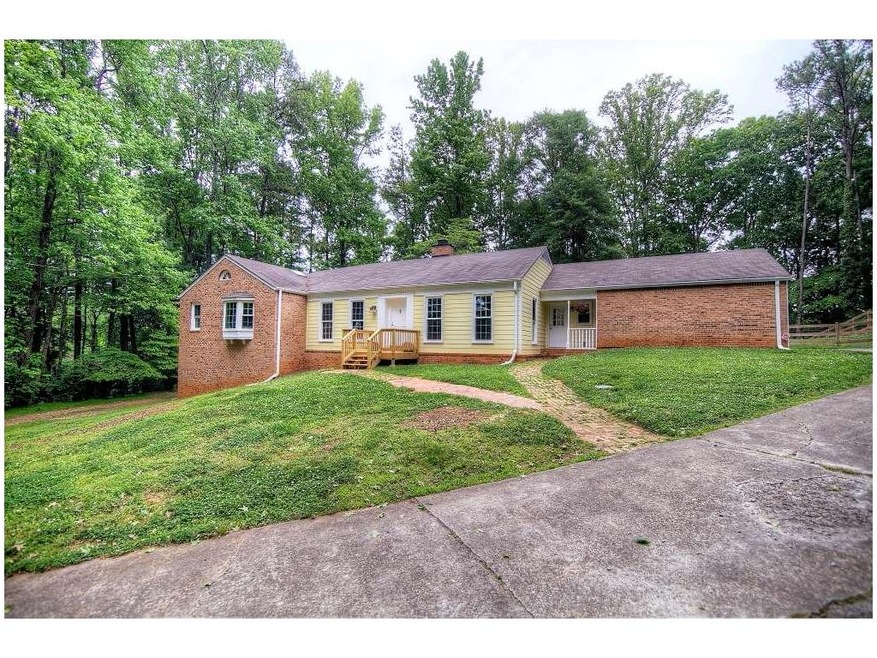 Private home on 1.6 acres of land backing to Cobbl