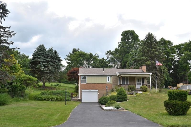 This well-maintained home stately sits on a nearly