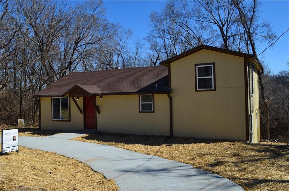 Front of Home with new circle driveway