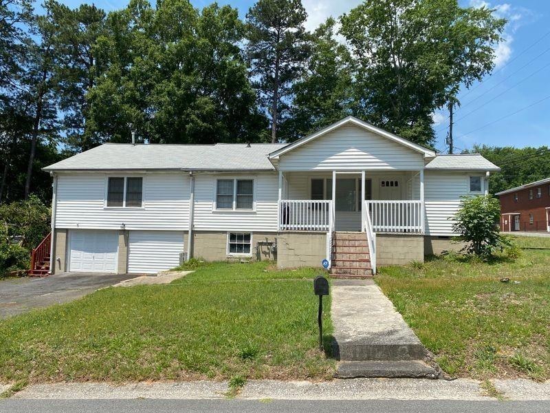 View of front of house featuring covered porch, a 