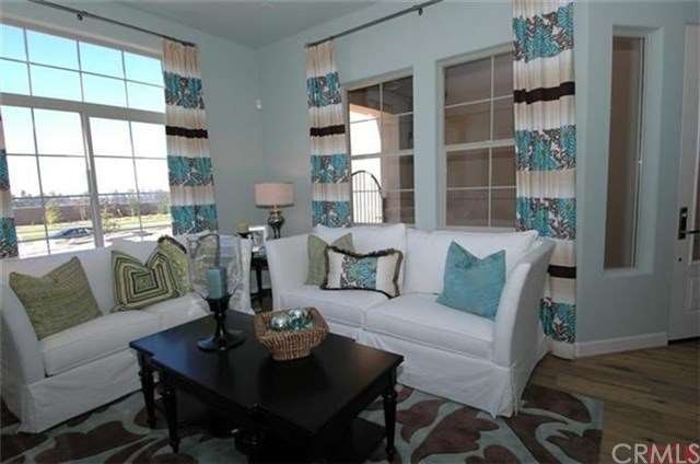 Living room has corner fireplace and is wired for 