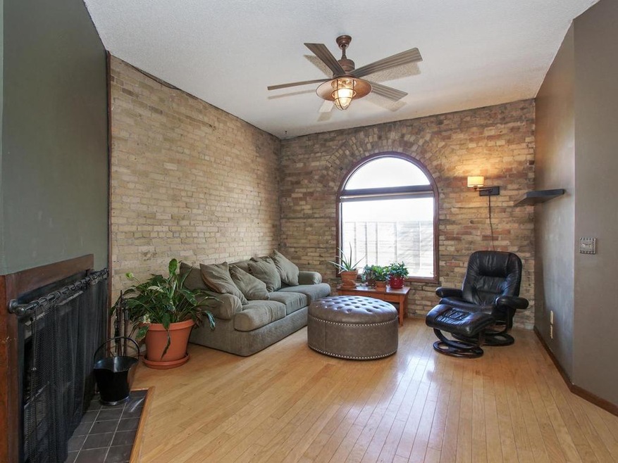 Vaulted ceilings, exposed brick, and natural sunli