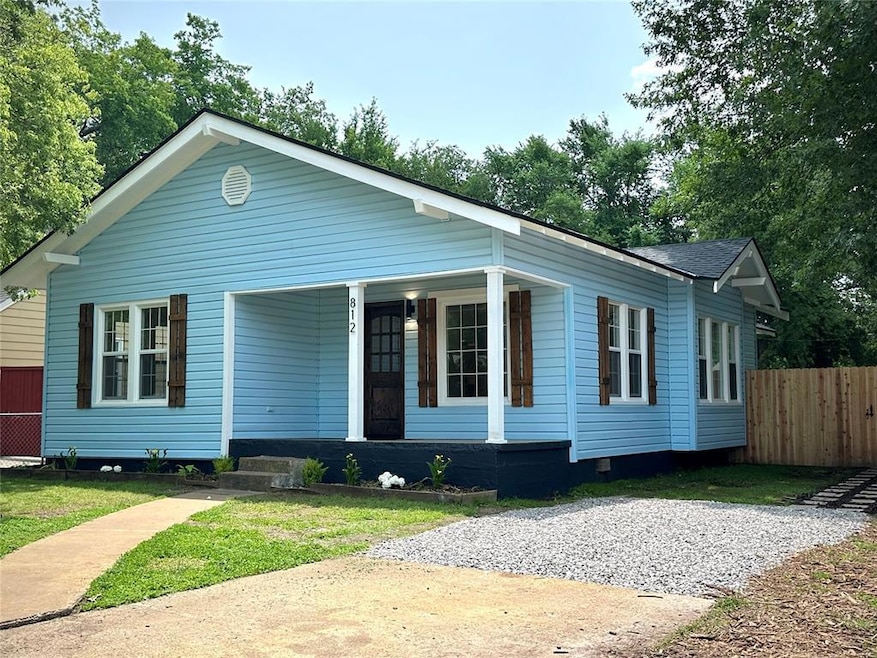 View of front of property with covered porch