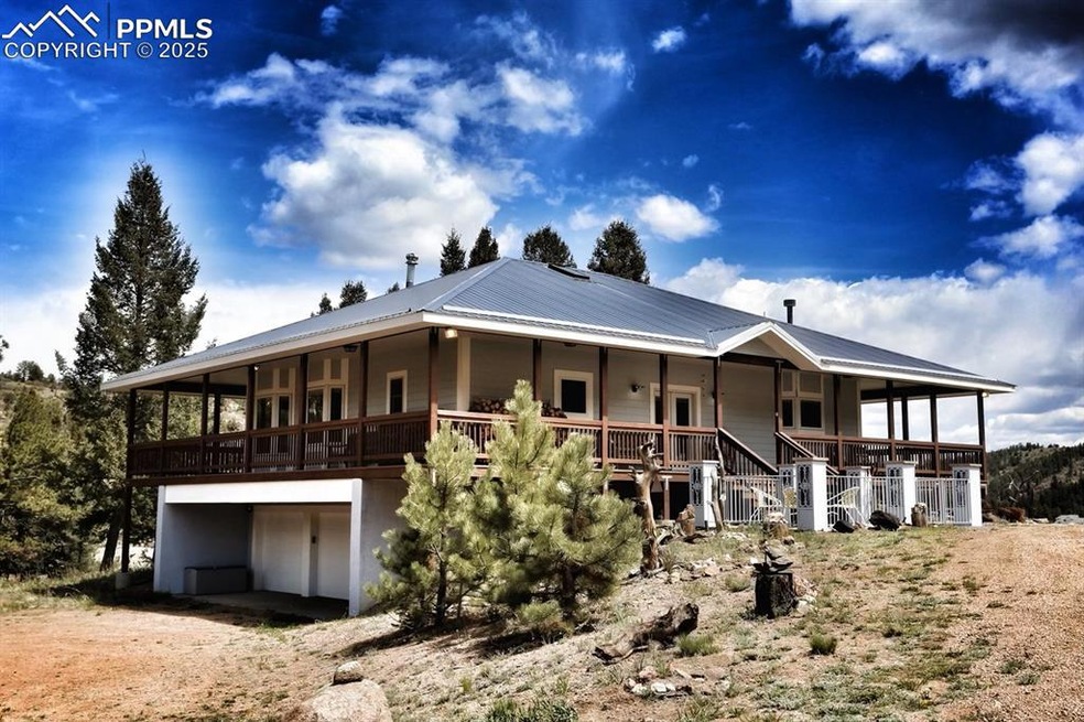 Custom built, metal roof, 3 car garage and so much more!
