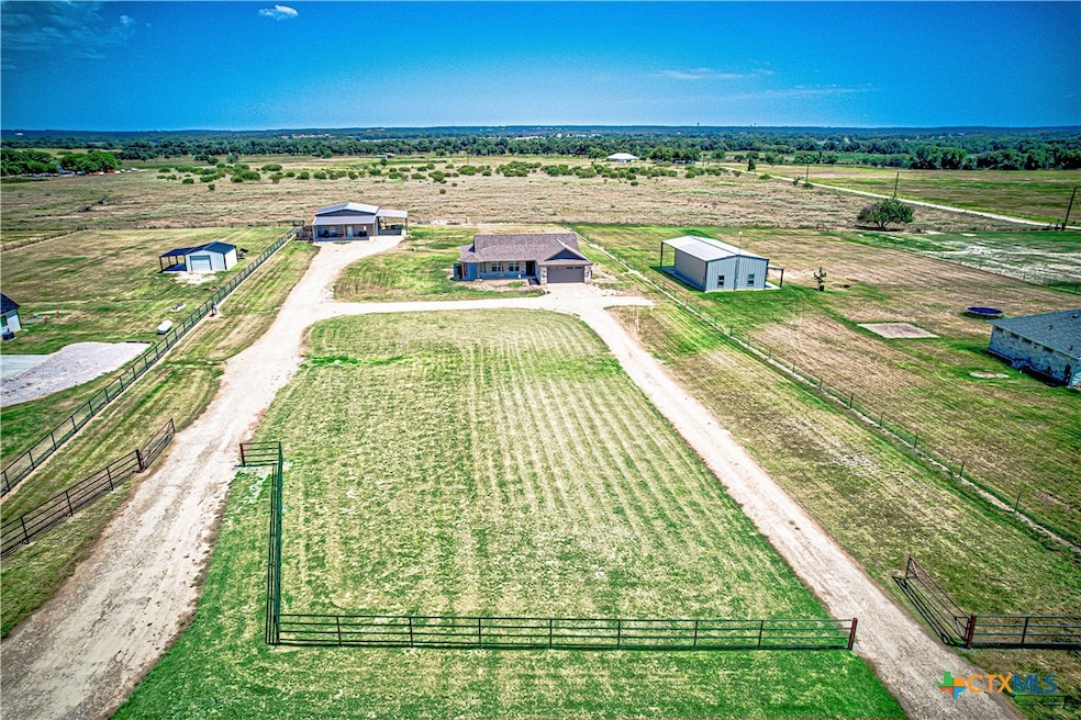Aerial view of pipe fencing across the front and r