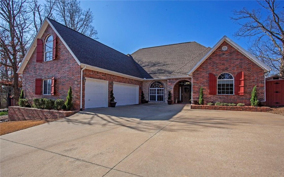 Circular drive to the spacious 3 car garage and professionally landscaped yard. Fully brick single owner custom built home in 2005. Welcome