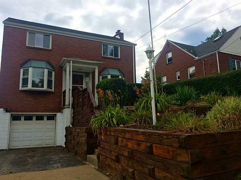 Exterior Front. Great landscaping, bonus workshop 