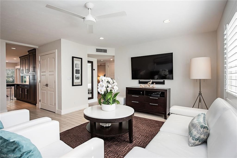 705 Neapolitan Way, Naples, FL 34103 - photo 1