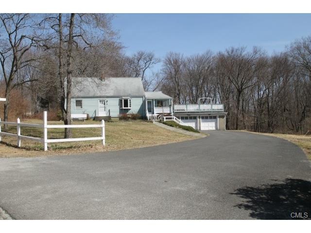 MONROE HOME LOCATED ON A LEVEL 1.35 ACRE