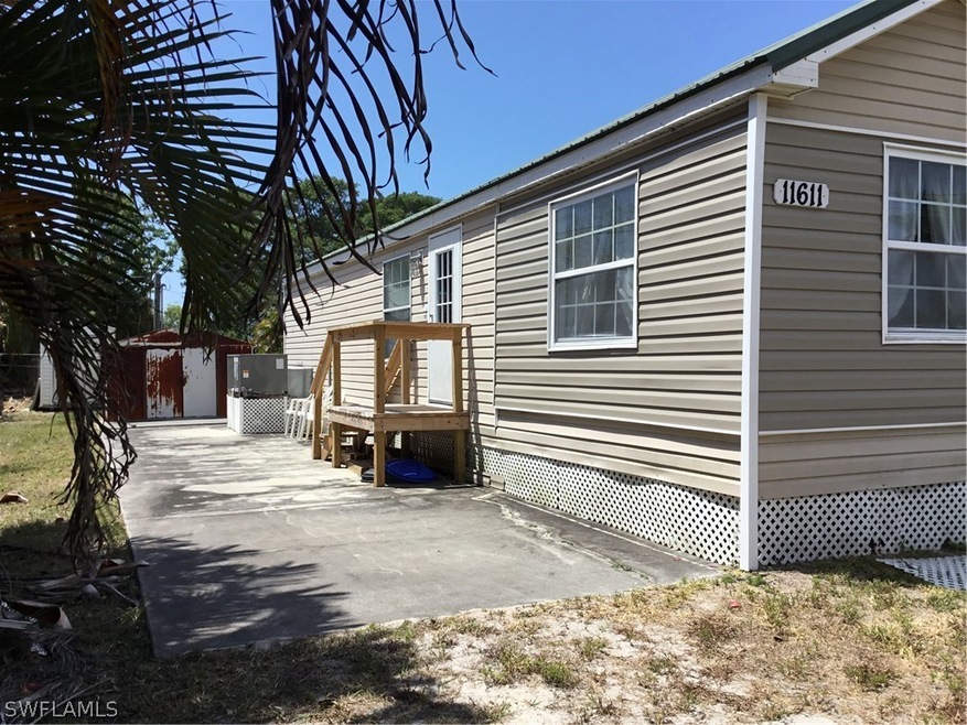 11611 Stringfellow Rd, Bokeelia, FL 33922 - photo 1