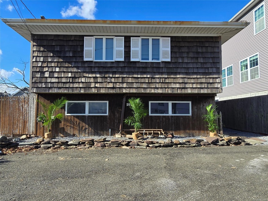 24 Suffolk Rd unit Upper, Island Park, NY 11558 - photo 1