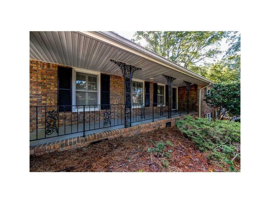 Exterior Front. Solid, welcoming ranch combines tr