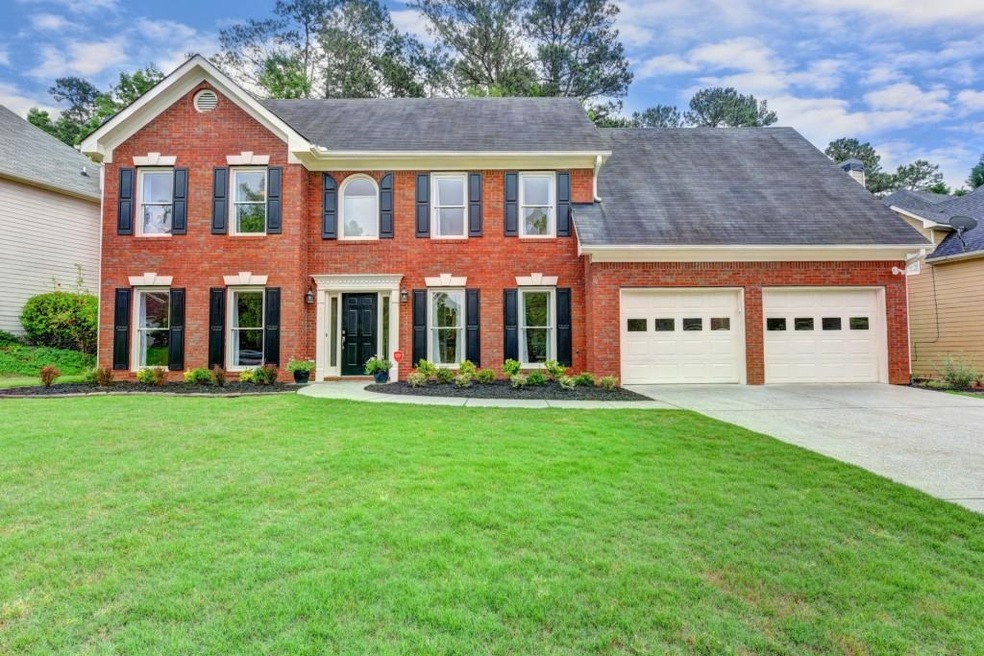 Gorgeous brick beauty with great open floorplan. N